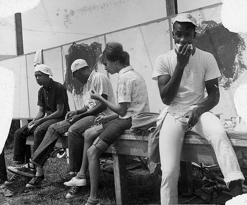 Youth on a break during "Operation Teacup,"an Easter week cleanup organized by the Student Committee for Improvement in Watts, at Watts Towers Arts Center