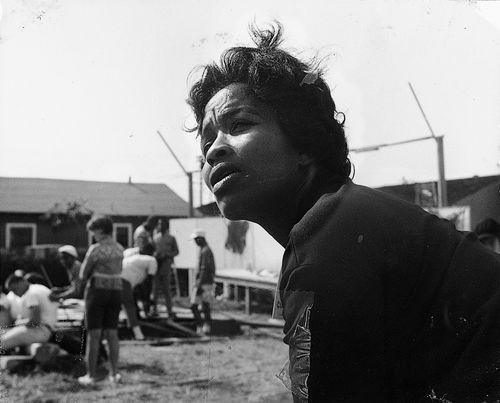 View of worker at Watts Towers Arts Center during "Operation Teacup," an Easter week cleanup organized by the Student Committee for Improvement in Watts, April 1965