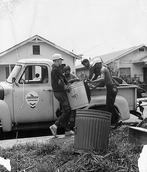 Teens working during "Operation Teacup," an Easter week clean up organized by the Student Committee for Improvement in Watts, April 1965