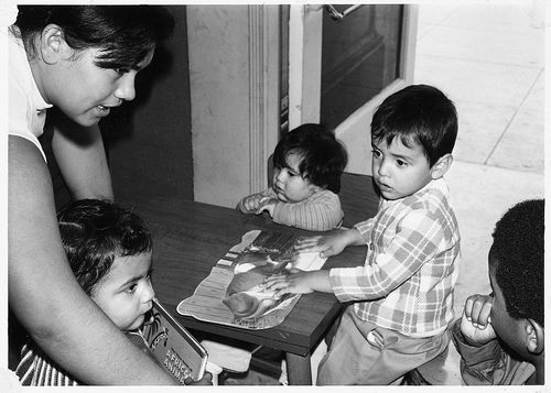 Kids' class at Watts Towers Arts Center showing a boy with a cow place mat.