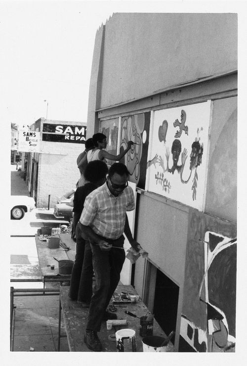 Mural project in Watts, 1960s. Noah Purifoy in foreground