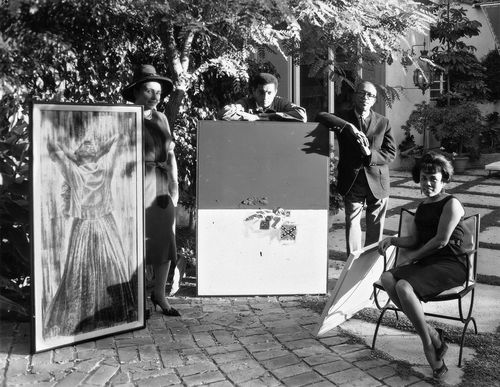 From left to right: Beate Inaya, Daniel LaRue Johnson, Charles White, and Betye Saar at the "Negro and Creative Arts Exhibit" at the Los Angeles home of actress Diana Lynn, organized by Beata Inaya, August 12, 1962