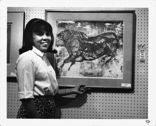 Betye Saar with her first-prize-winning print "Rojo Toro" at the Los Feliz/Hollywood Jewish Center, March 1965. 