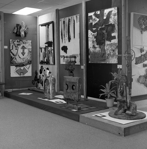 "66 Signs of Neon" exhibition at University of Southern California, Los Angeles, c. 1966. Noah Purifoy's"Sir Watts," 1966, is at left