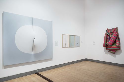 The Erotic gallery. From left to right: Zilia Sánchez, Lunar V (Moon V), 1975, Mercedes Elena González, Vulvosa (tríptico) (Vulviform [triptych]), 1979–81, and Marta Minujín, Colchón (Mattress), 1964/1985. Installation view at Brooklyn Museum, New York
