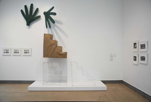Body Landscape gallery. From left to right: photographs of and elements from Sylvia Palacios Whitman's performance Passing Through, 1977, and photographs of her Sling Shot, 1975. Installation view at Brooklyn Museum, New York
