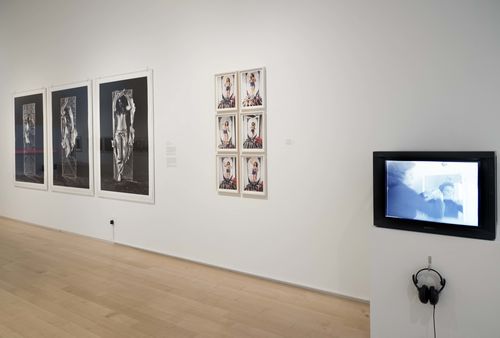 Self-Portrait gallery. From left to right: Lourdes Grobet, Hora y media (Hour and a half), 1975, Yolanda López, from the series Tableaux Vivant, 1978, and Letícia Parente, Preparação 1 (Preparation 1), 1975. Installation view at Brooklyn Museum, New York

