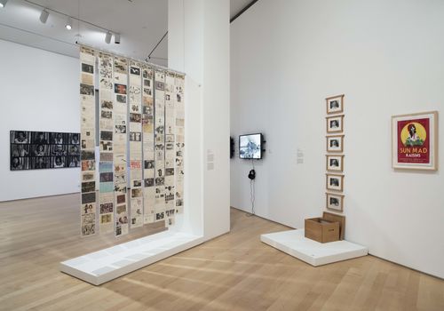 Social Places gallery. Foreground, from left to right: Graciela Gutiérrez Marx, Grupo de familia, Reconstrucción del mito (Family Group, Reconstruction of the Myth), 1980, Celia Alvarez Muñoz, La Honey (Enlightenment #9), 1983, and Ester Hernández, Sun Mad, 1982. Installation view at Brooklyn Museum, New York
