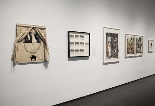 Feminisms gallery. From left to right: Mónica Mayer, A veces me espantan mis propios sentimientos, mis fantasías (Sometimes I’m frightened by my own feelings, my fantasies), 1977, and Lo normal (Quiero hacer el amor) (The normal [I want to make love]), 1978, Josely Carvalho, The Birth, 1981, and Waiting, 1982, and Barbara Carrasco, Pregnant Woman in a Ball of Yarn, 1978. Installation view at Brooklyn Museum, New York
