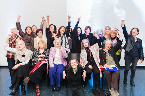 Radical Women artists and curators at the luncheon reception. Standing, from left to right: unknown guest,  Rosa Novarro, Poli Marichal, María Evelia Marmolejo, Analívia Cordeiro, curator Andrea Giunta, Janet Toro, curator Cecilia Fajardo-Hill, Graciela Carnevale, Sylvia Palacios Whitman, Victoria Cabezas, Josely Carvalho, Eugenia Vargas Pereira. Seated, from left to right: Carla Rippey, Anna Bella Geiger, Delfina Bernal, Ani Villaneuva, Sandra Llano-Mejia, Catalina Parra. Brooklyn Museum, April 12, 2018
