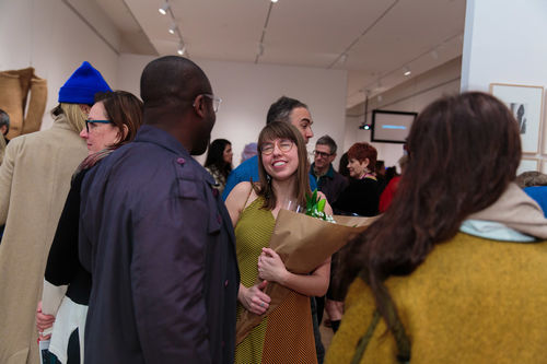 Assistant curator Carmen Hermo (center) and guests at the opening of Radical Women. Brooklyn Museum, April 12, 2018
