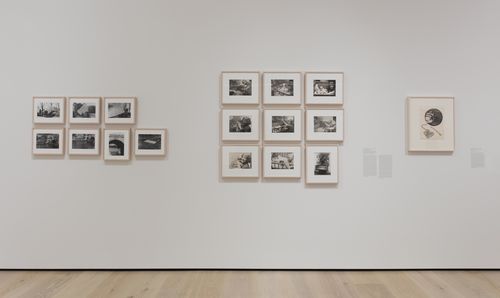 Feminisms gallery. From left to right: Lea Lublin, Dissolution dans l'eau, Pont Marie, 17 heures (Dissolution in the Water, Pont Marie, 5pm), 1976, and Mon Fils (My Son), 1968,and Barbara Carrasco, Pregnant Woman in a Ball of Yarn, 1978. Installation view at the Hammer Museum, Los Angeles