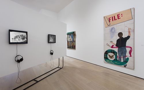 Social Places gallery. On monitors, from left to right: Marta Minujín and Rubén Santantonín, La Menesunda (Mayhem), 1965, and Patssi Valdez, Hot Pink, 1980; right wall, foreground: Barbara Carrasco, Censorship, 1984. Installation view at the Hammer Museum, Los Angeles