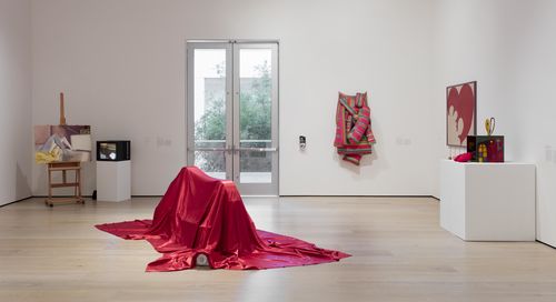 The Erotic gallery. Center, on floor: Feliza Bursztyn, Cama (Bed), 1974; background, from left to right: Karen Lamassonne, Ruido (Noise), 1984, Marta Minujín, Colchón (Mattress), 1964/1985, Delia Cancela, Corazón destrozado (Destroyed Heart), 1964, and Teresinha Soares, Caixa de fazer amor (Lovemaking Box), 1967. Installation view at the Hammer Museum, Los Angeles