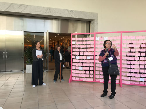 Artist Mónica Mayer in front of El tendedero (The Clothesline) at the Radical Women artists' walkthrough. Hammer Museum, Los Angeles, September 16, 2017
