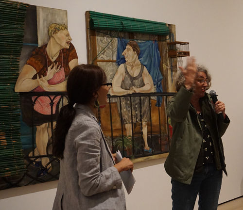 Curator Andrea Giunta (left) and artist Marcia Schvartz in front of Schvartz's Les veines/Las vecinas (The Neighbors), 1980, at the Radical Women artists' walkthrough. Hammer Museum, Los Angeles, September 16, 2017
