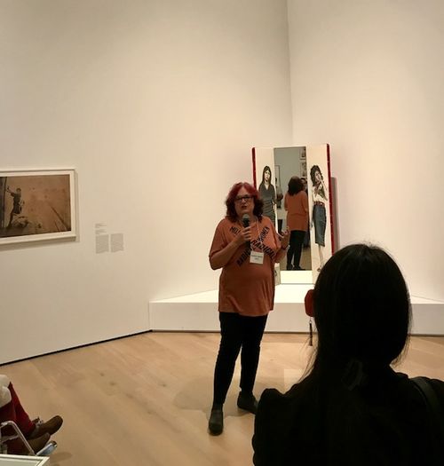Artist Judith F. Baca in front of Las Tres Marías (The three Marias), 1976, at the Radical Women artists' walkthrough. Hammer Museum, Los Angeles
