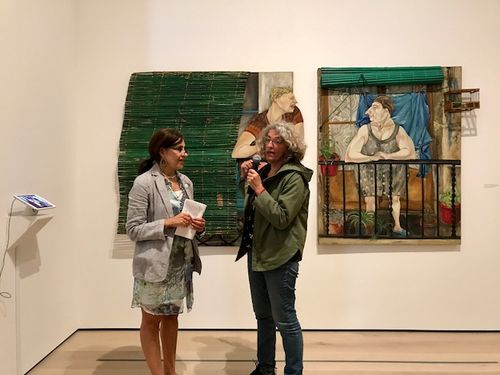Curator Andrea Giunta (left) and artist Marcia Schvartz in front of Schvartz's Les veines/Las vecinas (The Neighbors), 1980, at the Radical Women artists' walkthrough. Hammer Museum, Los Angeles