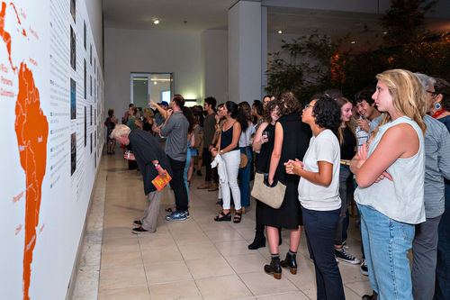 Guests look at the historical timeline at the opening of Radical Women. Hammer Museum, Los Angeles, September 16, 2017
