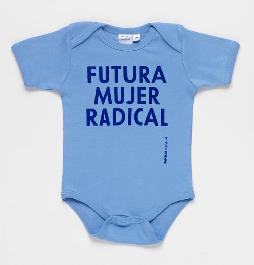 Blue Futura Mujer Radical baby onesie. Hammer Museum, Los Angeles