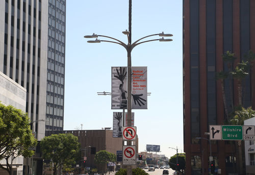 Photograph of street pole banner for Radical Women, featuring Sylvia Palacios Whitman, Passing Through, 1977. Hammer Museum, Los Angeles
