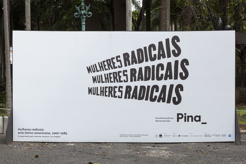 Exhibition billboard outside of museum. Museum façade with exhibition banner. Pinacoteca de São Paulo
