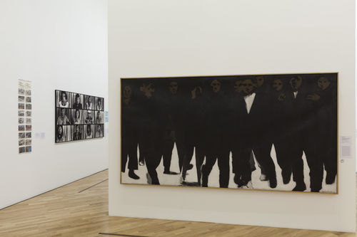 Lugares sociais (Social Places) gallery. From left to right: Anna Bella Geiger, Brasil nativo, Brasil Alienígena (Native Brazil/Alien Brazil), 1977, Claudia Andujar, works from the series Marcados (Marked), 1981–83, and Gracia Barrios, América no invoco tu nombre en vano (America, I don’t take your name in vain), 1970. Installation view at Pinacoteca de São Paulo
