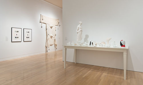 Foreground: Fred Wilson, "Love and Loss in the Milky Way," 2005; rear wall, from left to right: Glenn Ligon, "Condition Report," 2000, and Nayland Blake, "Dual Restraint," 1990. Installation view at the Hammer Museum, Los Angeles