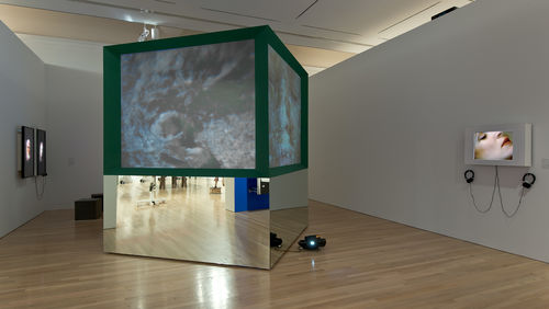 Left wall: Judith Barry, ". . . Cairo Stories," 2010–2011; center: Judith Barry, "Imagination, Dead Imagine," 1991; right wall: Judith Barry, "Casual Shopper," 1980–81. Installation view at the Hammer Museum, Los Angeles