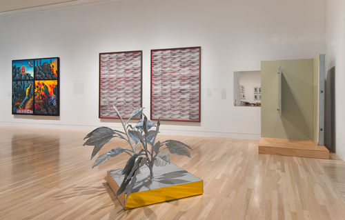 Foreground: Tom Burr, "Silver Plant Platform," 1997; rear wall, from left to right: David Wojnarowicz, "The Death of American Spirituality," 1987, two works by Mary Kelly: "Mimus, Act I (Posner)," 2012, and "Mimus, Act II (Meyers)," 2012, and Tom Burr, "Single Partition Platform," 1997. Installation view at the Hammer Museum, Los Angeles
