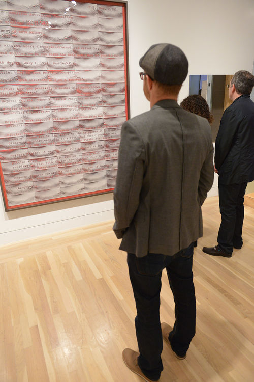 Guests in front of Mary Kelly, <em>Mimus, Act II (Meyers) </em>, 2012, during the opening of "Take It or Leave It," Hammer Museum, Los Angeles, February 8, 2014