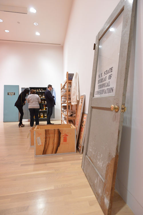 Guests in gallery with two Mark Dion installations during the opening of "Take It or Leave It," Hammer Museum, Los Angeles, February 8, 2014