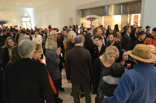 Guests outside galleries during the opening of "Take It or Leave It." Artist William Leavitt (in glasses) can be seen at center. Hammer Museum, Los Angeles, February 8, 2014