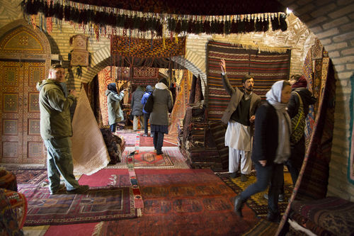 Visiting a carpet store in Kabul at the base of the historic Gardens of Babur. Photo: Lisa Anne Auerbach