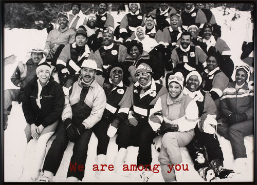 Adrian Piper. Safe #1–4. 1990. Mixed-medium installation. Screenprinted text on four black-and-white photographs, mounted on foam core and affixed to the corners of a room, with audio. 30 1/4 x 42 in (76.8 x 106.7 cm); 24 5/8 x 39 ¼ in (62.5 x 99.7 cm); 30 7/16 x 24 15/16 in. (77.3 x 63.1 cm); and 44 5/16 x 36in. (112.6 x 99.1 cm). Detail: #1 of 4. Collection Adrian Piper Research Archive. Foundation Berlin. © Adrian Piper Research Archive Foundation Berlin.