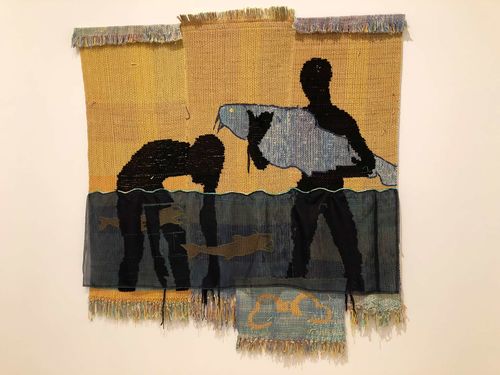Weaving of black figures catching catfish with their hands