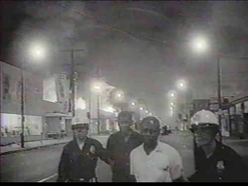 Tony Cokes, Black Celebration (A Rebellion Against the Commodity), 1988. Video, black and white, stereo, 17:11 min. Hammer Museum, Los Angeles.  Purchased through the Board of Overseers Acquisition Fund. Photo courtesy of the artist, Greene Naftali, New York, and Electronic Arts Intermix (EAI), New York