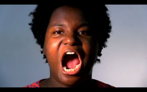 Video still from The Cross-Examination endurance performance. 2014