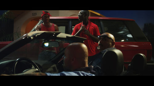 Neïl Beloufa. Still from Production Value, 2013. Mixed-media installation with two-channel video, color, sound. Dimensions variable. 80:00 min. Courtesy François Ghebaly Gallery, Los Angeles, and the artist. Produced by Petit Film with the support of Audi Talents Award in coproduction with Sysmic Films and Turtle Cove.