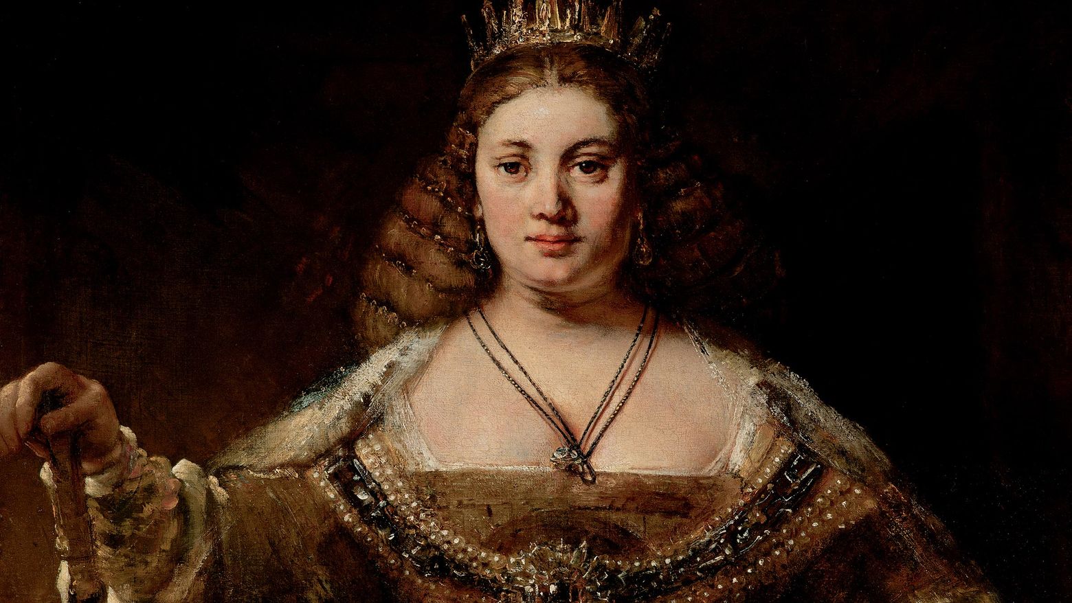 A portrait of a woman dressed in regal clothing with a crown