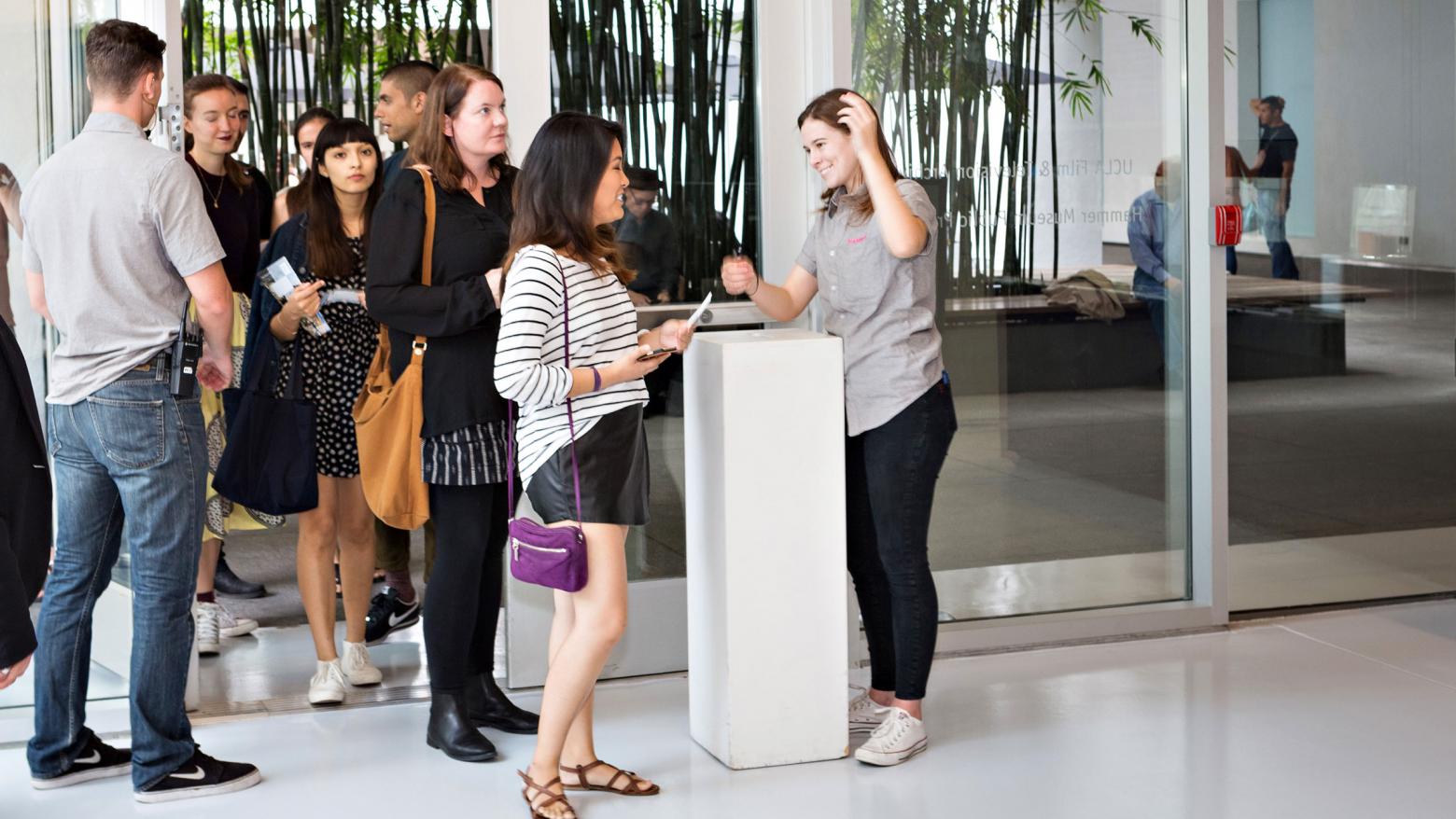 Visitors enter the theater at the Hammer Museum