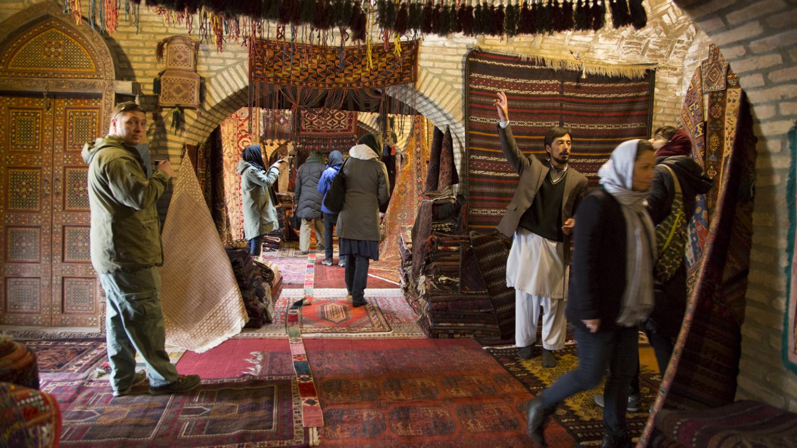 Visiting a carpet store in Kabul at the base of the historic Gardens of Babur. Photo: Lisa Anne Auerbach
