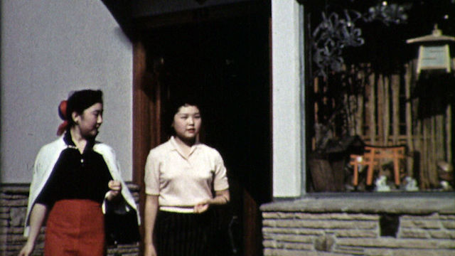 Still from the film The Challenge (1957) showing two young girls walking