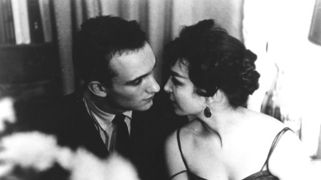 Still from the film Shadows (1961) showing a couple leaning in toward each other