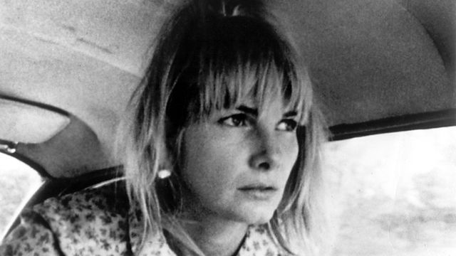 Still from the film Wanda (1971) showing a woman inside a car staring intensely