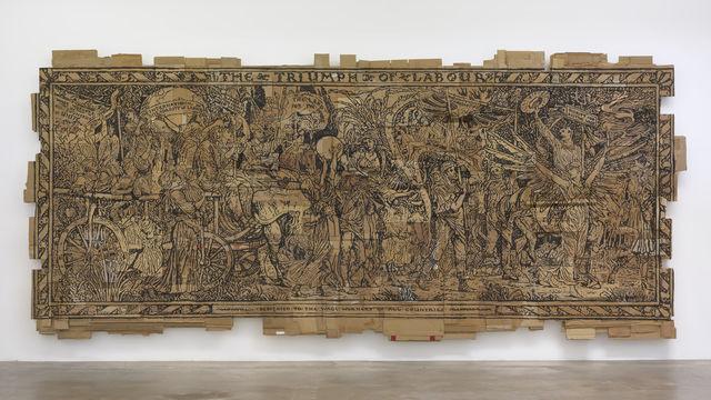 A large drawing made on top of cardboard boxes showing people laboring.