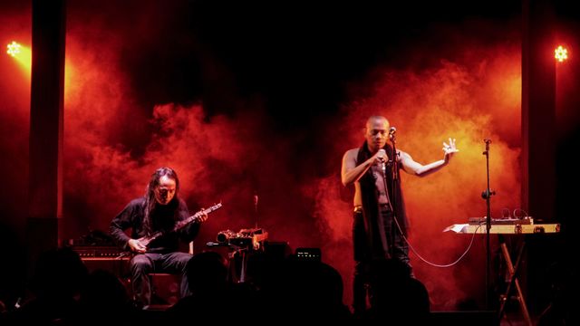 Photo of the musical duo Senyawa performing on stage.