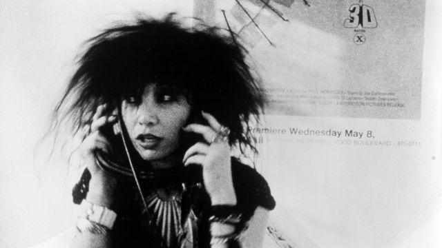 A woman with large headphones.