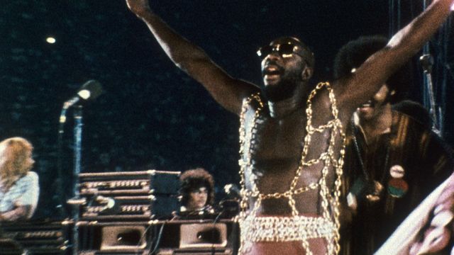 Isaac Hayes performing live in a still from the film "Wattstax" (1973)