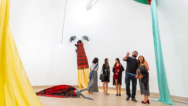 Visitors in an art gallery